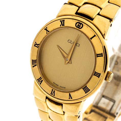 gucci gold watch women